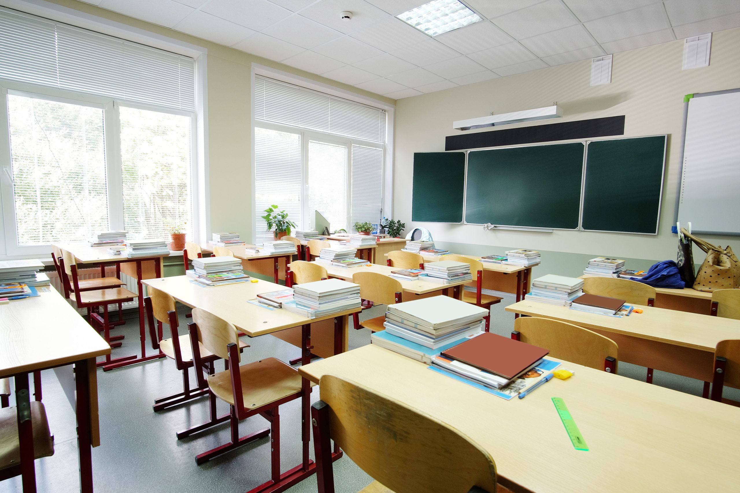 What are some tips for involving teachers and staff in school cleaning efforts?